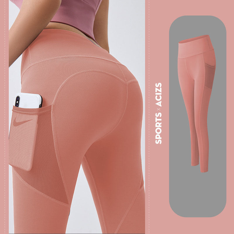 Women’s yoga leggings with phone pocket, peach pink, high-rise back view.