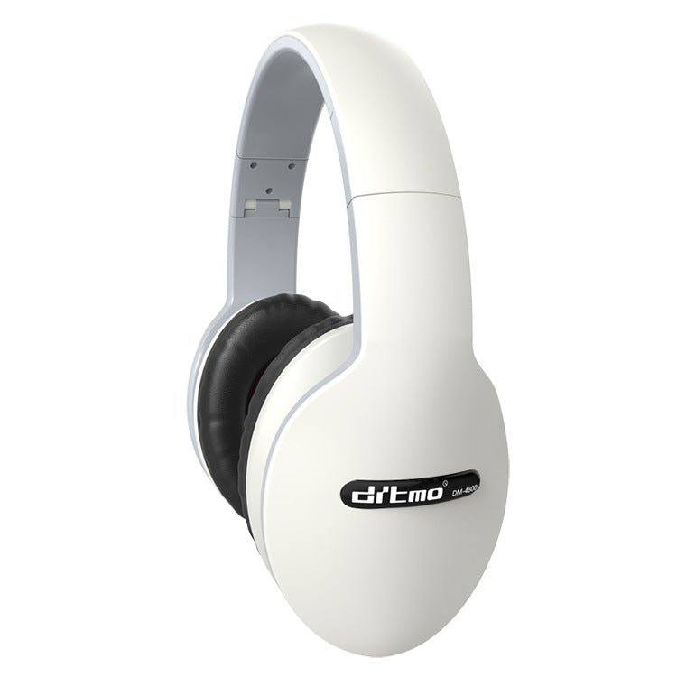 White wired gaming headset with padded over-ear cups and black speaker grille