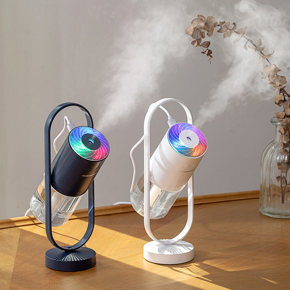 Dark blue USB air humidifier with mist chamber and light ring on stand