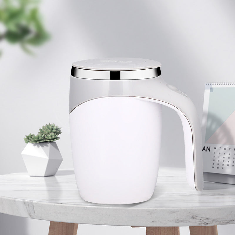 Rechargeable electric stirring cup in white with lid and side handle