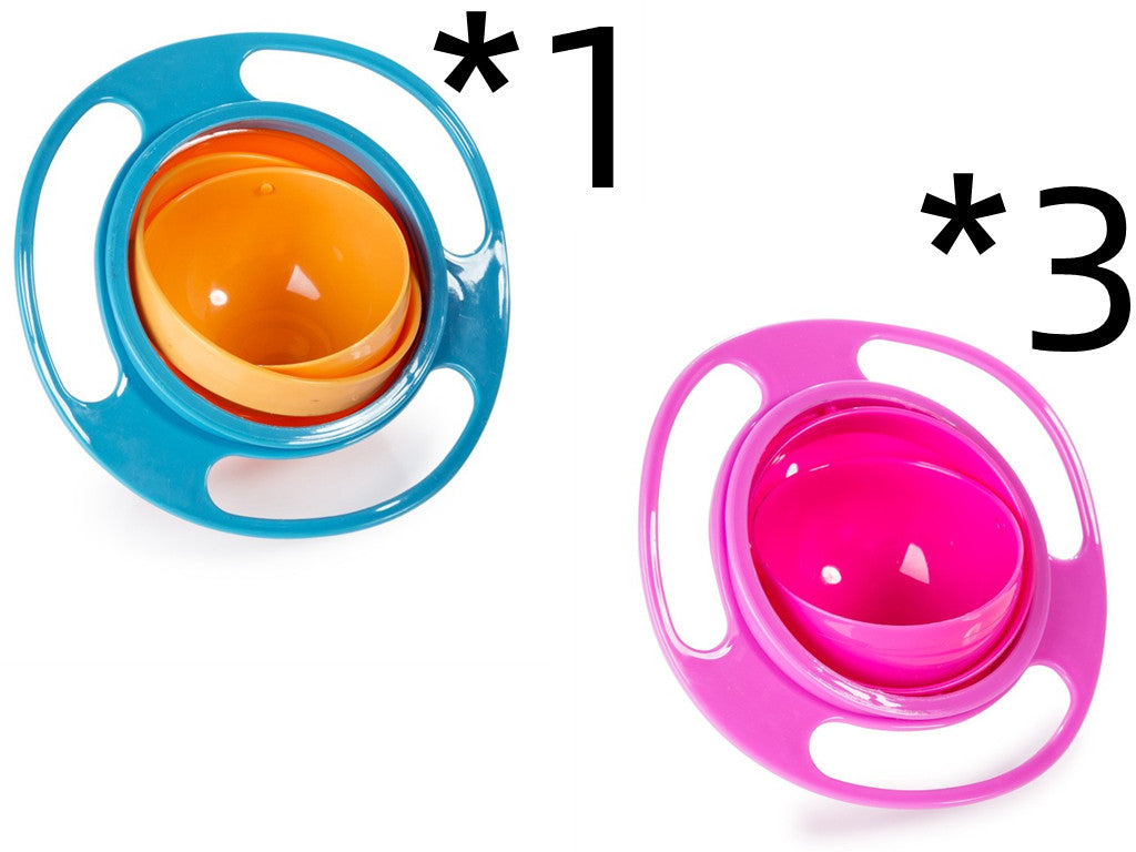 Rotating spill-proof bowl dish set with blue and pink outer rings, orange and magenta bowls