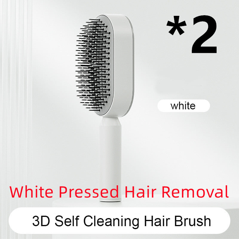 Self-cleaning airbag hair brush with white handle and black bristle head