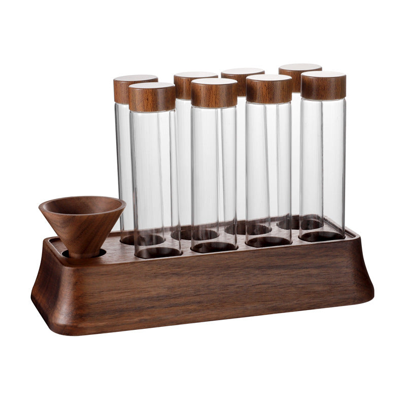 Wooden coffee bean display stand with clear tubes, cork tops, and coffee beans in bases