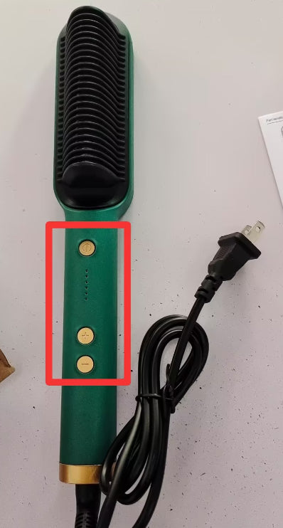 Green hot comb hair brush with control buttons and attached power cord