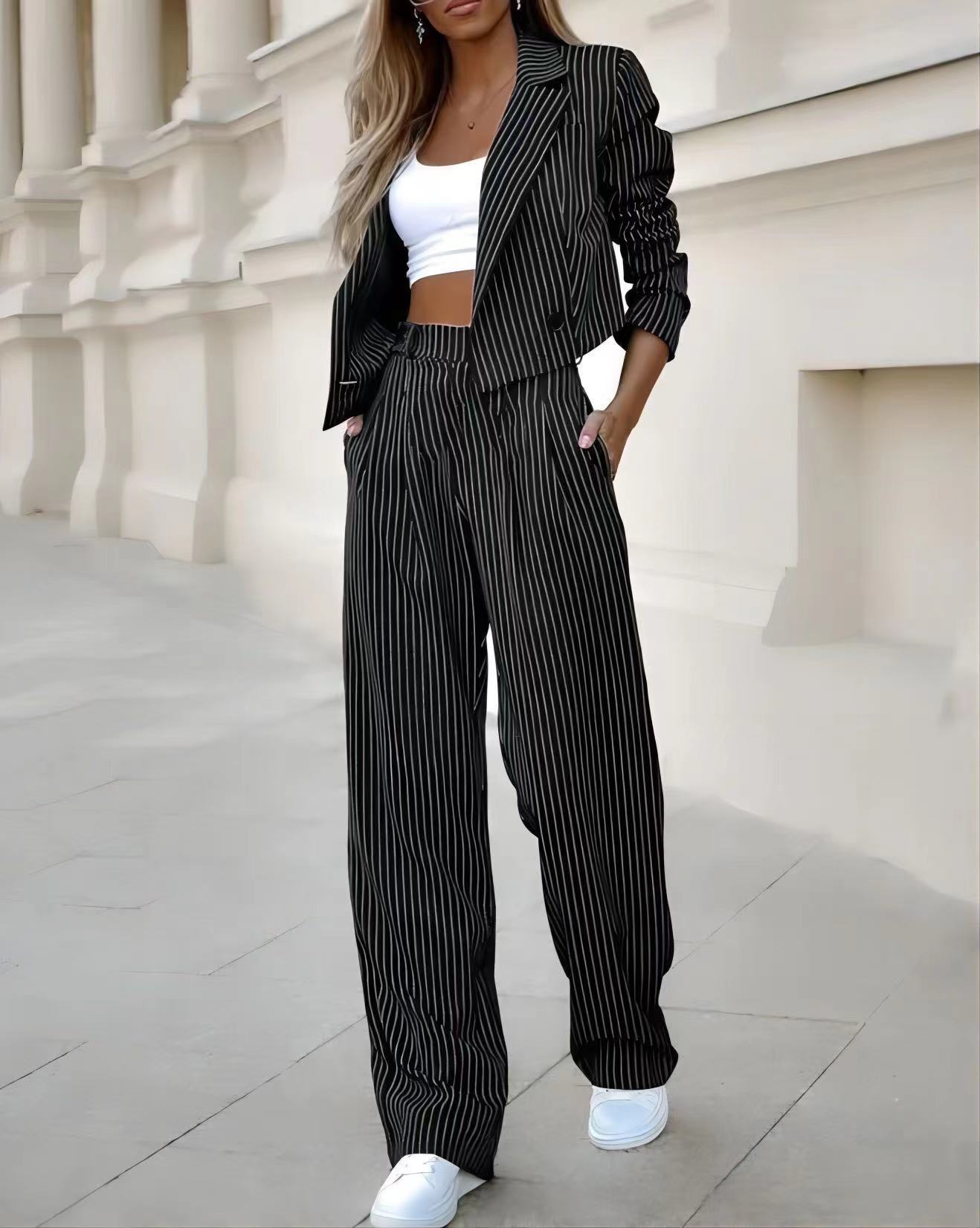 Women's striped suit set: black pinstripe cropped top, blazer jacket, straight pants