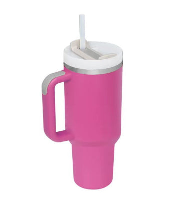 Pink insulated tumbler with handle and straw, rounded lidded top.