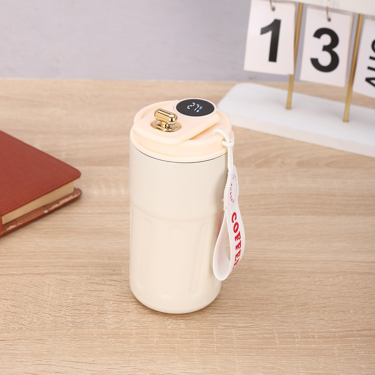 450ml insulated thermal bottle with white body, cream top, digital temperature display