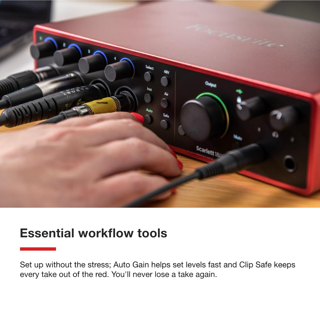 Red Focusrite Scarlett 18i16 USB audio interface with hand adjusting a front knob