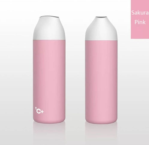 Insulated vacuum thermos bottle with pink body and white top, cC+ marking