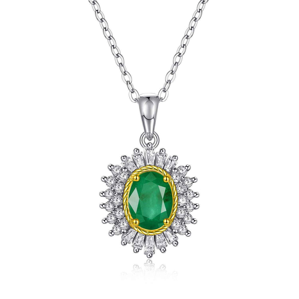 Silver pendant necklace with oval green gemstone center, gold bezel, crystal halo, full view