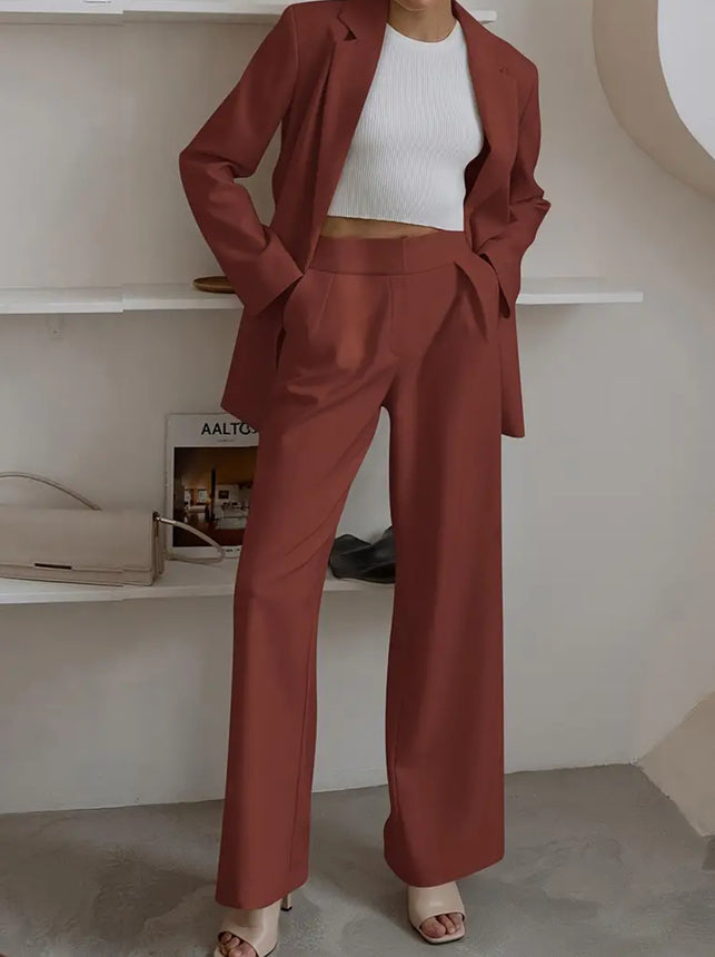 Women’s blazer and wide-leg trousers suit, rust brown, relaxed fit with flap pockets