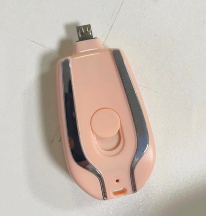 Peach mini keychain power bank pod charger with USB connector and button