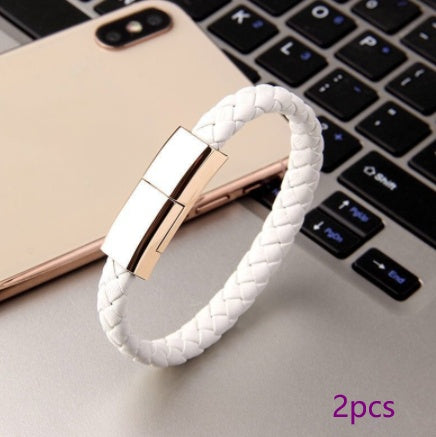 White braided charging cable bracelet with rose-gold metal clasp and USB connector