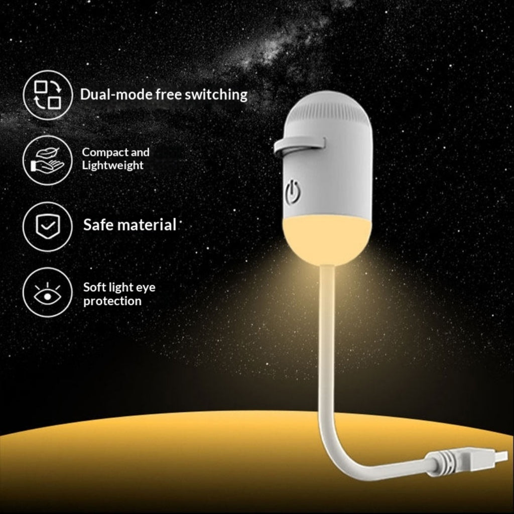 White USB star night light lamp with warm glowing bulb and attached charging cable
