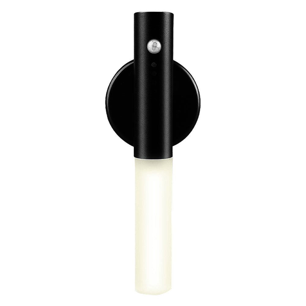Black magnetic night light with round cap, white cylinder, and sensor indicator