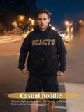 Black long-sleeve printed hoodie with hood, drawstrings, and front SCAGTO graphic.