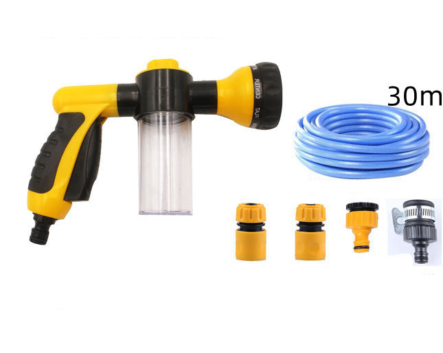 Yellow foam spray gun with clear bottle, blue hose coil, plus four yellow and gray attachments