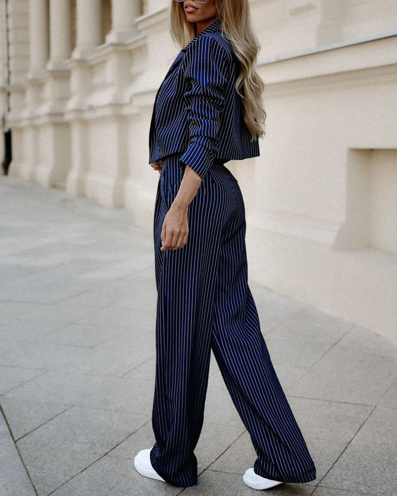 Navy pinstripe blazer and matching straight-leg pants with elbow-length sleeves