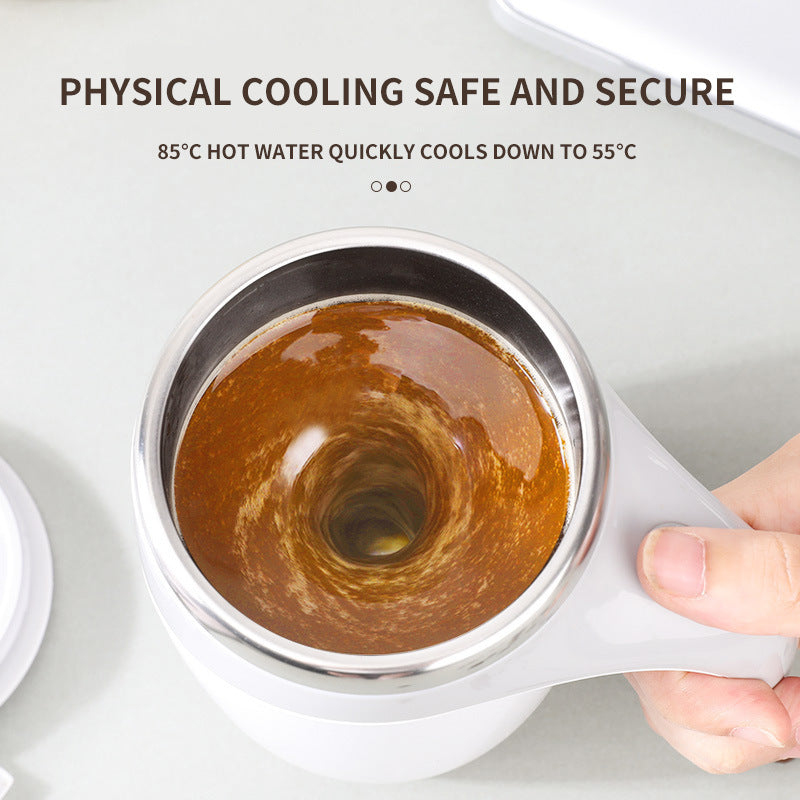 Electric stirring cup with stainless inner bowl, brown liquid visible in white cup