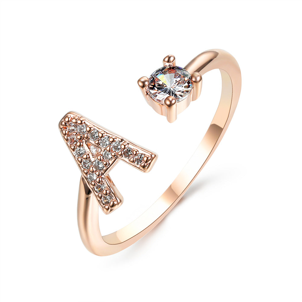 Rose gold initial T ring with round crystal center and pave T detail