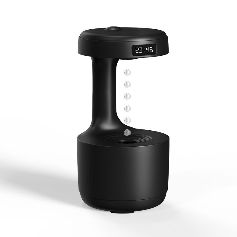 Black cool mist humidifier with LED clock display and suspended water droplets.