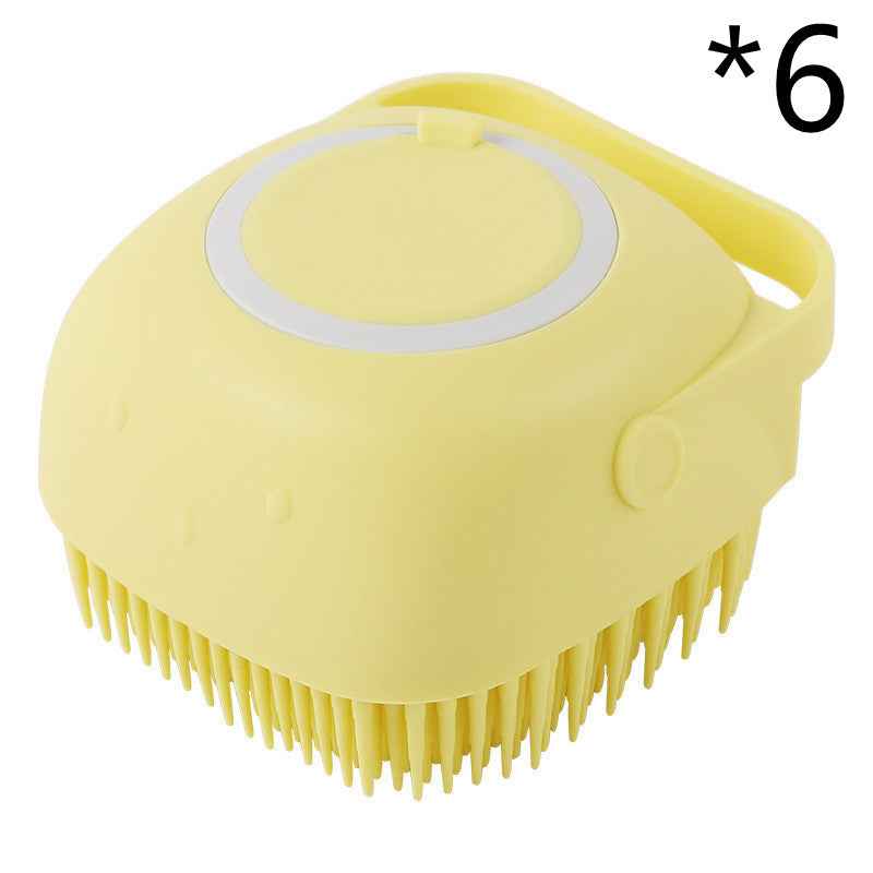Yellow silicone pet bath brush with circular lid and flexible bristles