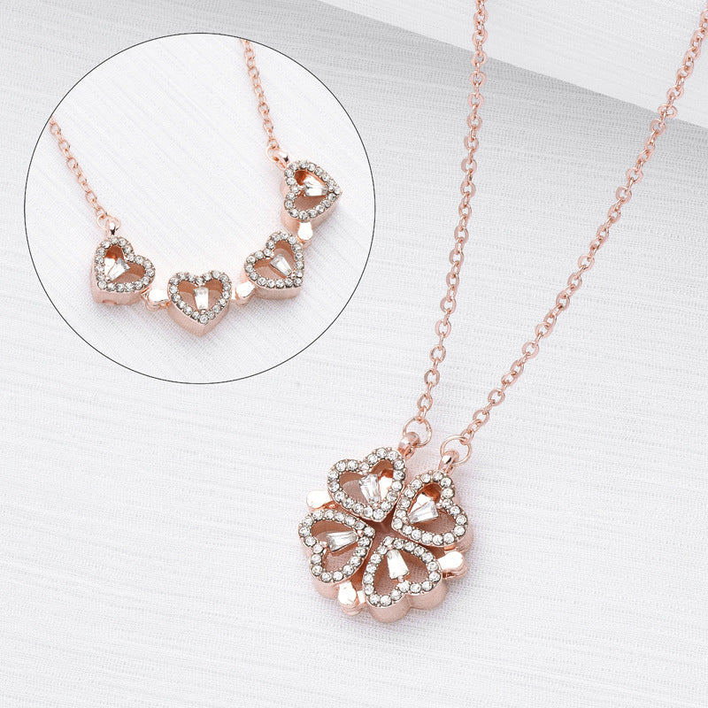 Rose gold-tone heart clover pendant necklace with crystal charm cluster on chain