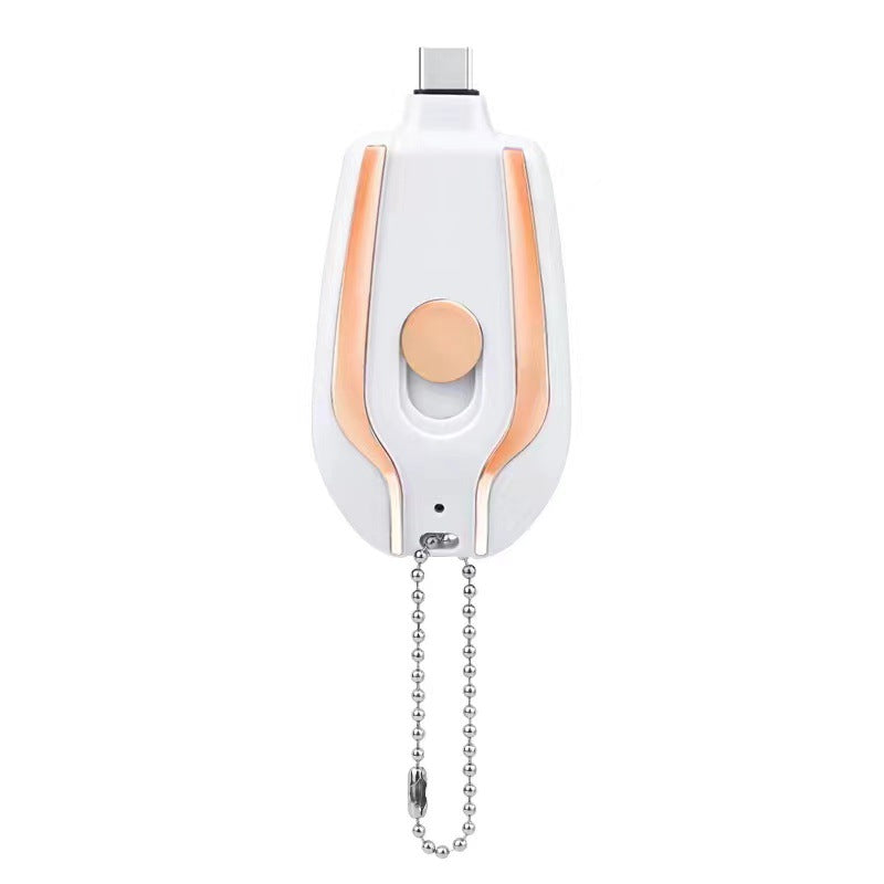 White mini keychain power bank pod charger with orange accents and bead chain