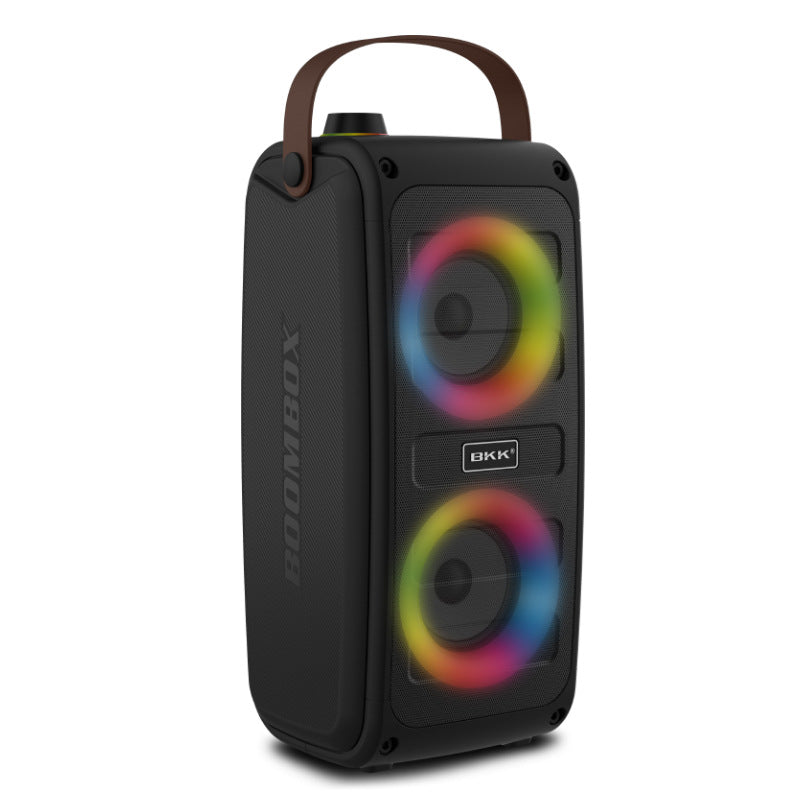 Black portable Bluetooth speaker side view with handle and dual lit speaker drivers.