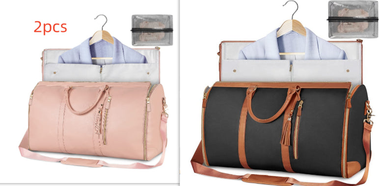 Light pink and black foldable travel duffle bag with front zipper and shoulder strap