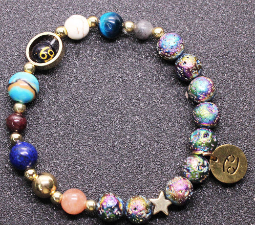 Beaded bracelet with multicolor iridescent beads, star charm, and zodiac coin charm