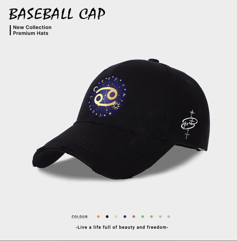 Black baseball cap with blue-and-gold zodiac emblem on front, white side planet icon