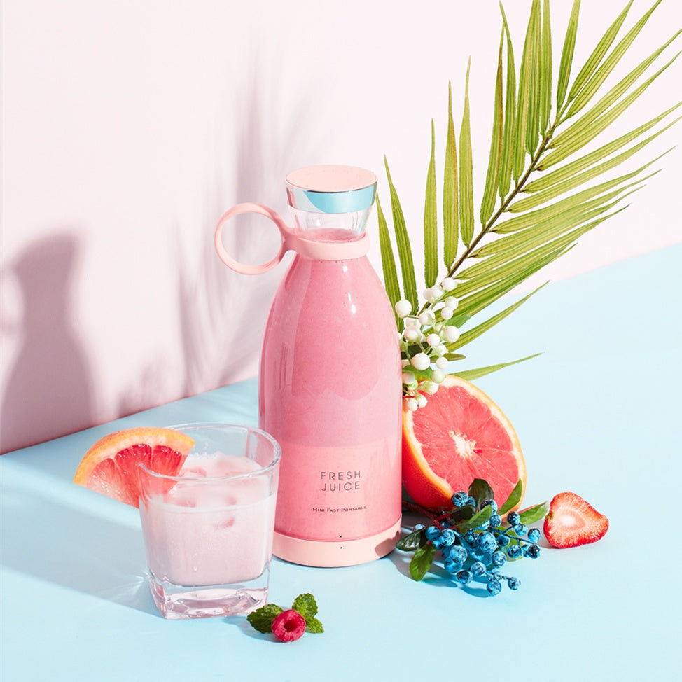 Pink portable electric juicer blender bottle with lid and drink cup