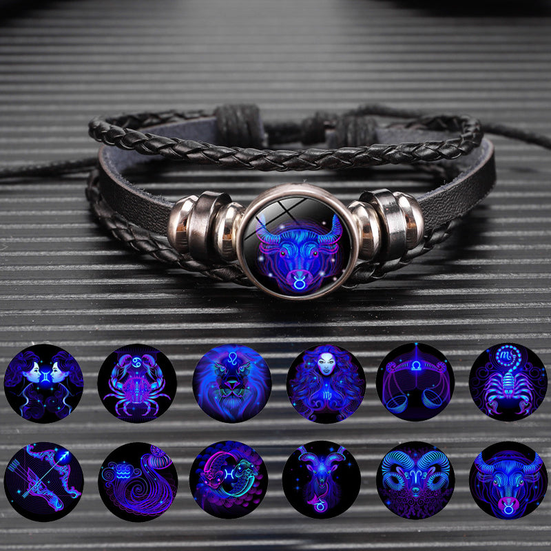 Black braided leather bracelet with oval luminous zodiac charm and silver rings