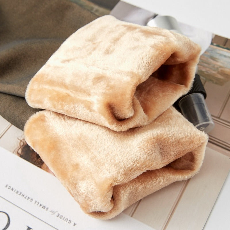 Fleece-lined tights, beige plush fabric folds stacked for viewing