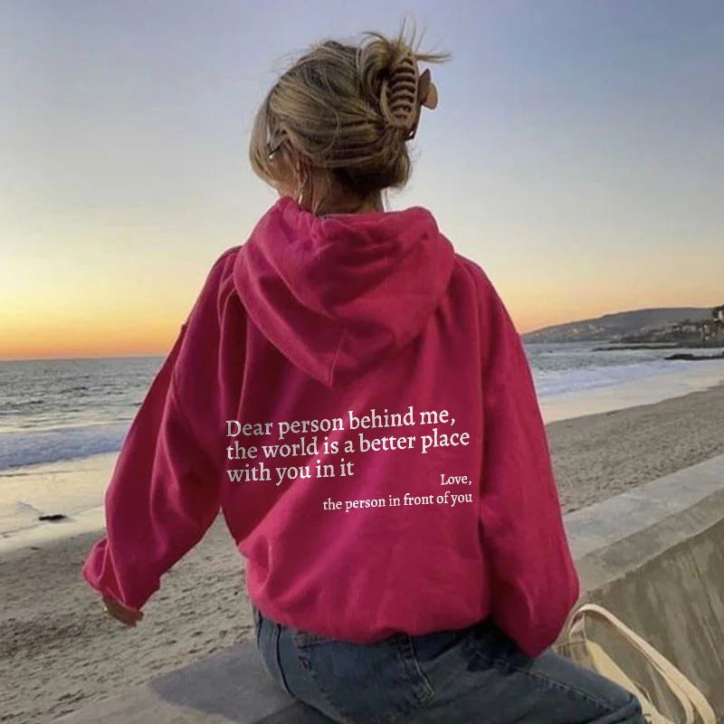 Magenta plush letter-print kangaroo-pocket hoodie, back view with hood and pocket