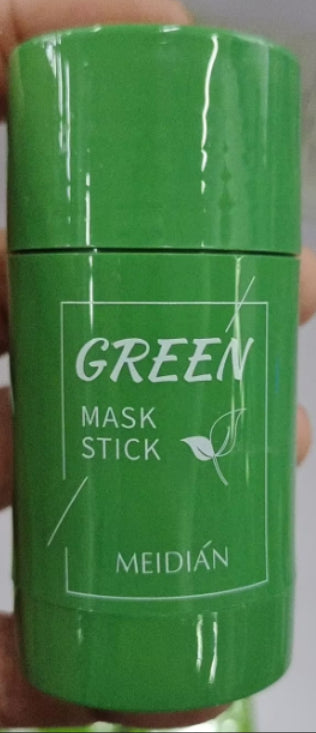 Close-up of green mask stick clay container labeled "GREEN" and "MEIDIAN"