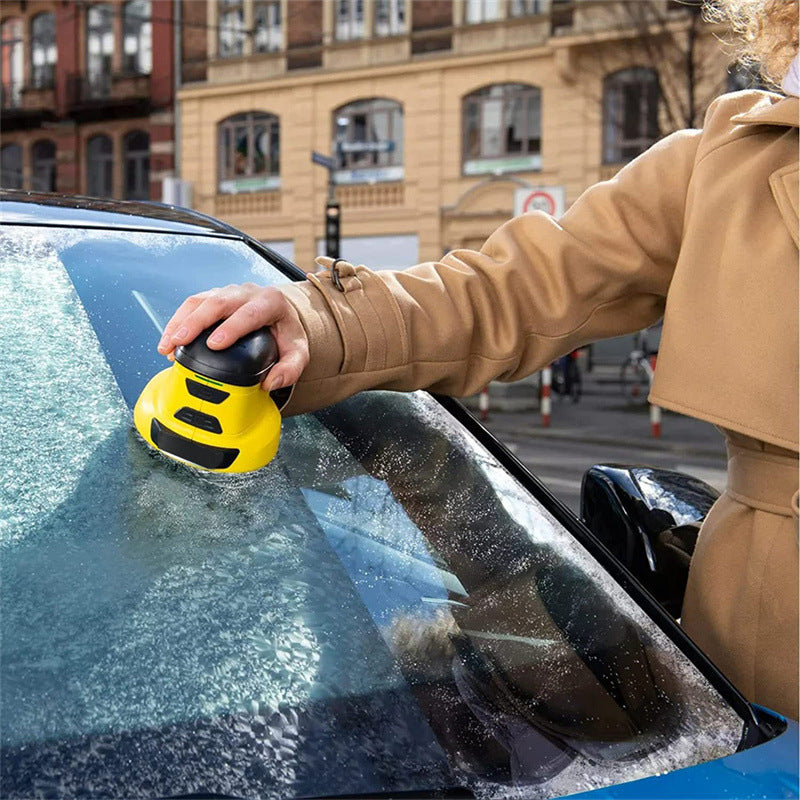 Yellow cordless electric snow scraper, handheld with black base and vents