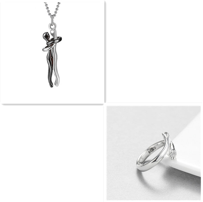 Silver hug-pendant necklace with silver chain and silver-tone ring, polished metal