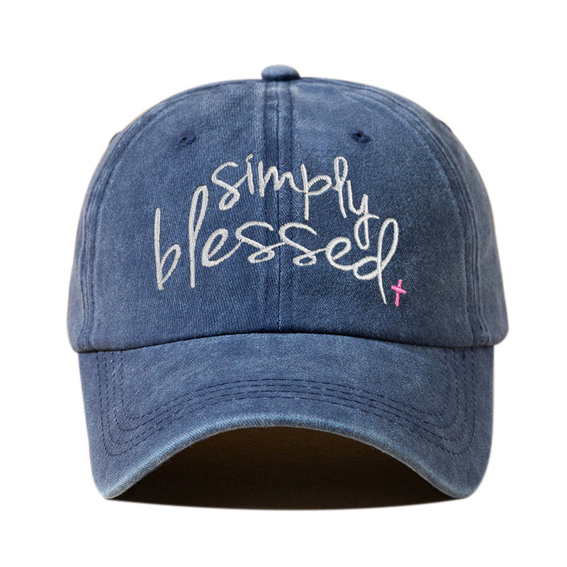 Dark washed baseball cap with embroidered “Simply Blessed” script