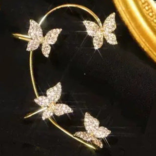 Gold butterfly hoop ear cuff with five glitter butterfly charms and prongs