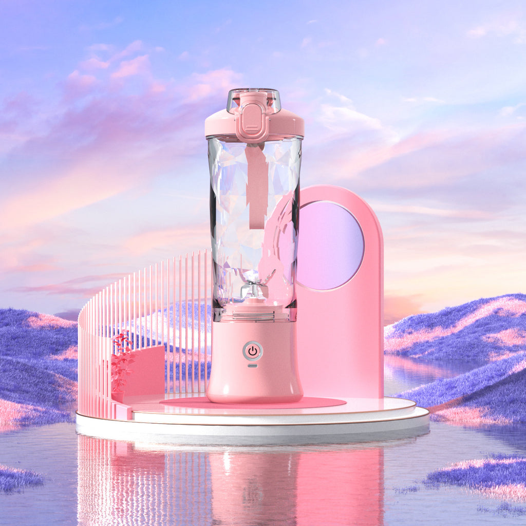 Portable blender with clear blending bottle and pink body, shown on round stand