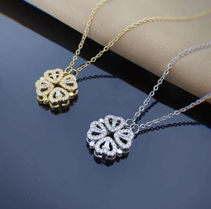 Four-leaf clover pendant necklace set with gold and silver tone chains