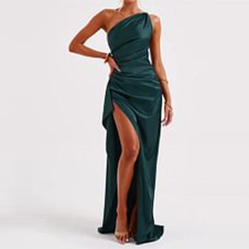 One-shoulder satin dress in dark green with side slit and sleeveless fitted bodice