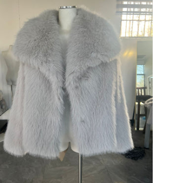 Light gray plush faux-fur coat with wide lapels and long sleeves