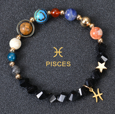 Zodiac beaded bracelet with black faceted beads, gold spacers, Pisces charm and star