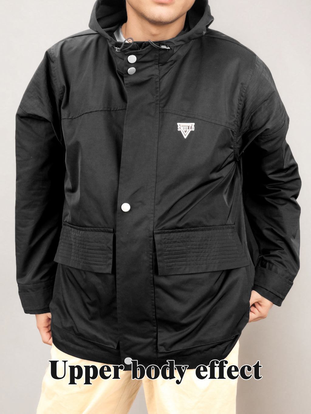 Black hooded rain jacket front view with snap placket and chest logo patch