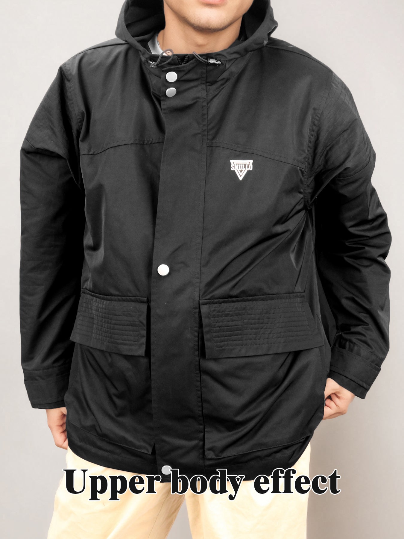 Black hooded rain jacket front view with snap placket and chest logo patch