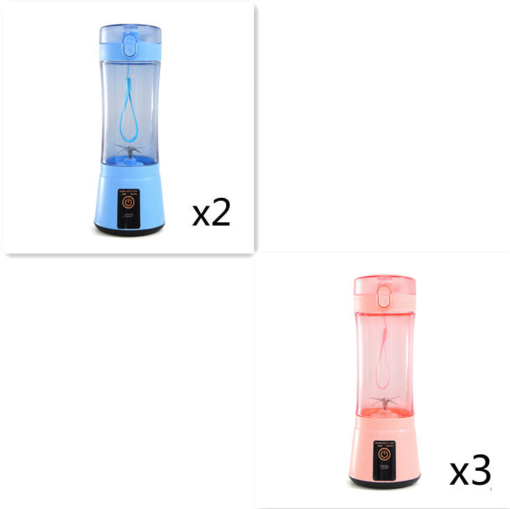 Portable electric fruit juicer blender with clear cup and light blue and pink bases