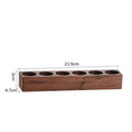 Wooden bean bottle rack with circular openings and 4.7 cm height marking